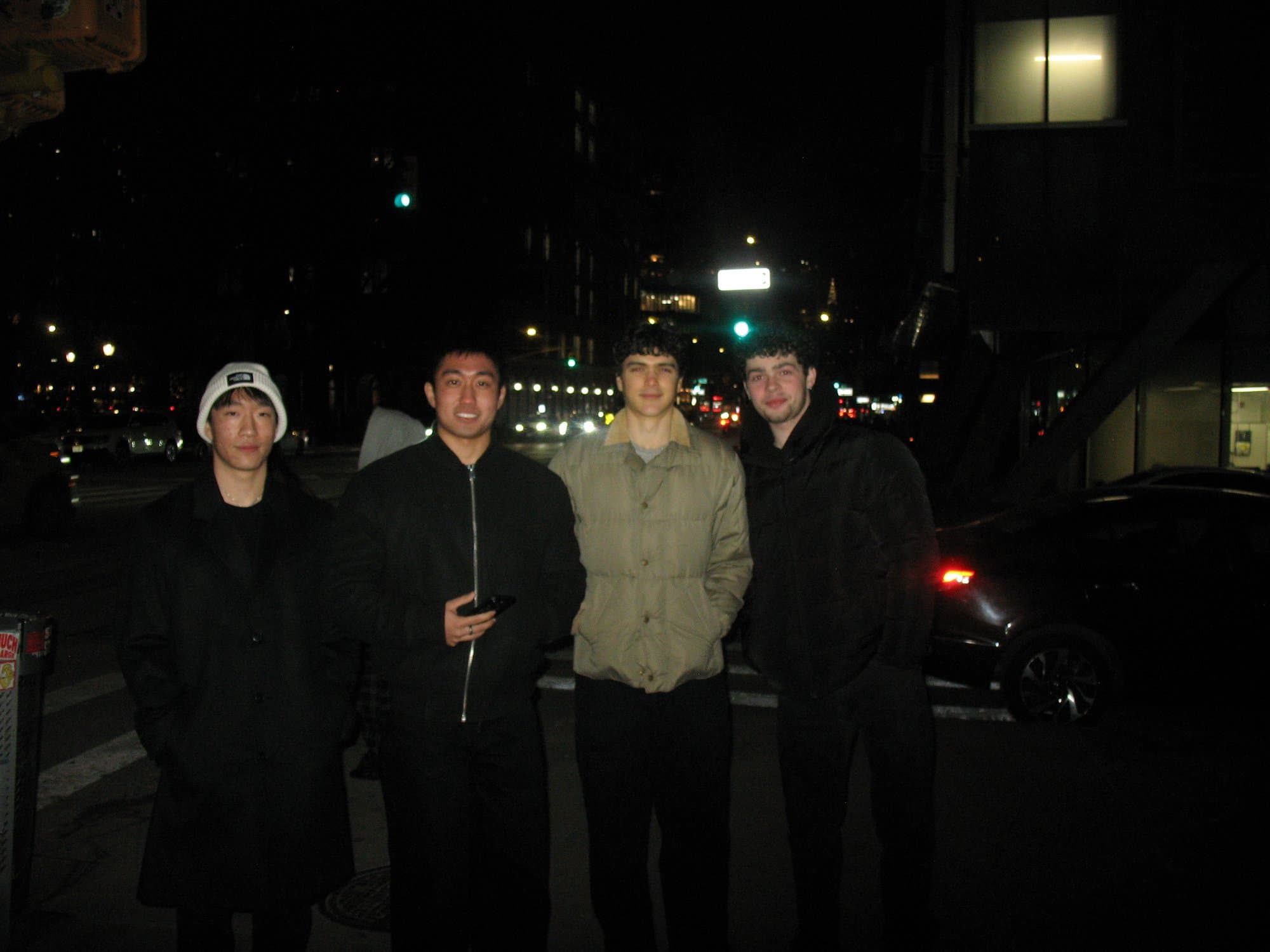 Four brothers out in the city at night